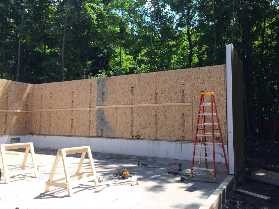 Installation of SIPs for a structural panel garage in New York