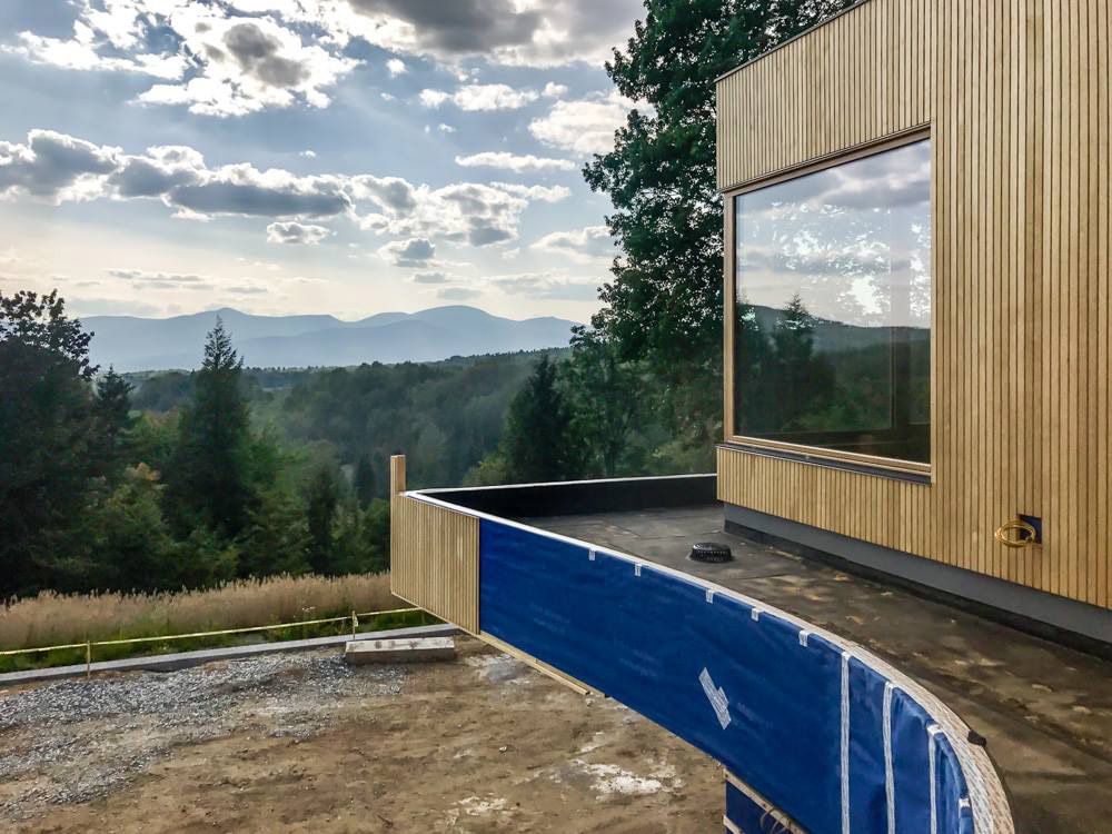 Exterior in progress of a SIP wall project in Stowe, Vermont